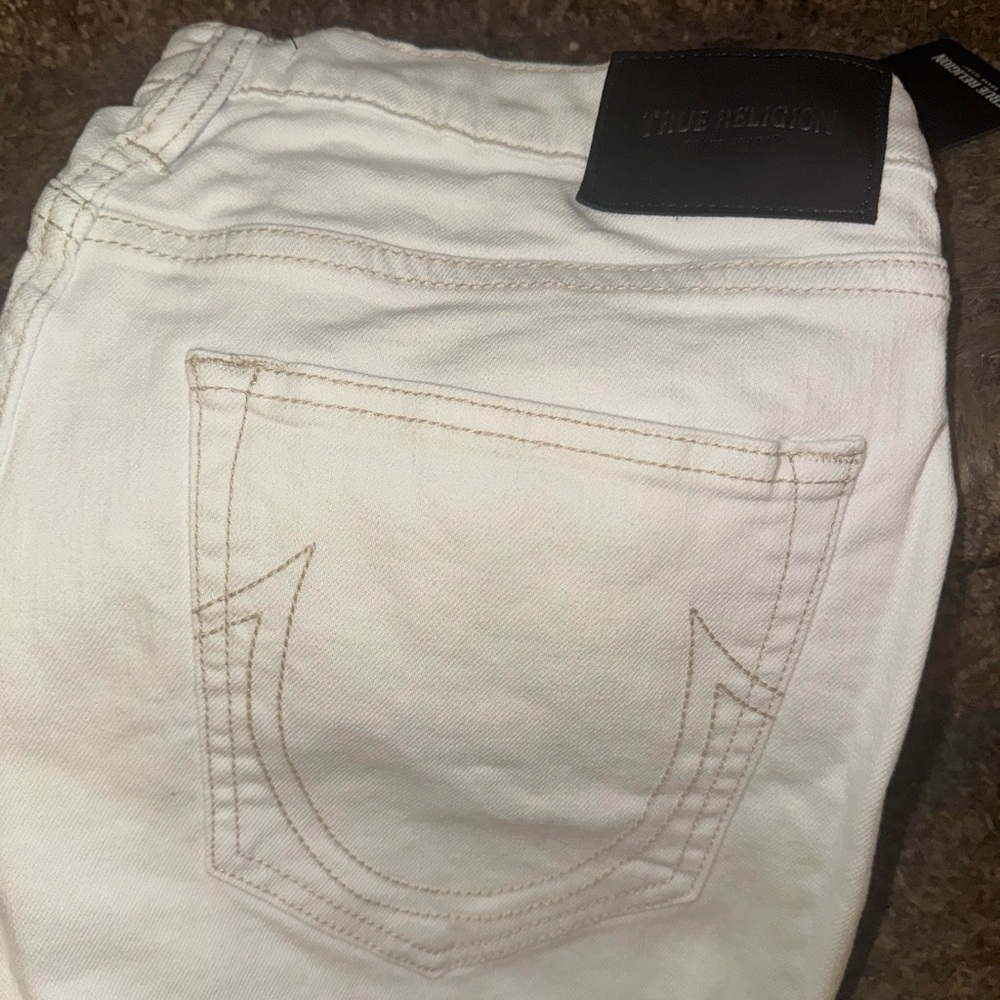 BRAND NEW TRUE RELIGION JEANS.
